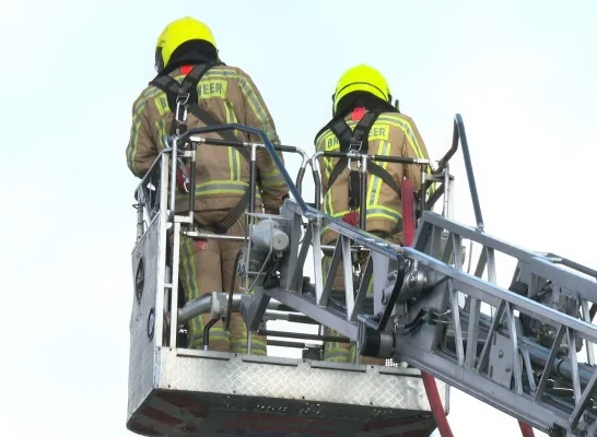 Brandweer op ladder