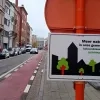 Greenpeace plakt bomenstickers Mechelen